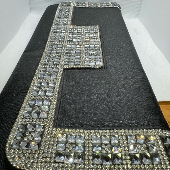 Jeweled black clutch with metal shoulder strap. - Picture 3 of 8